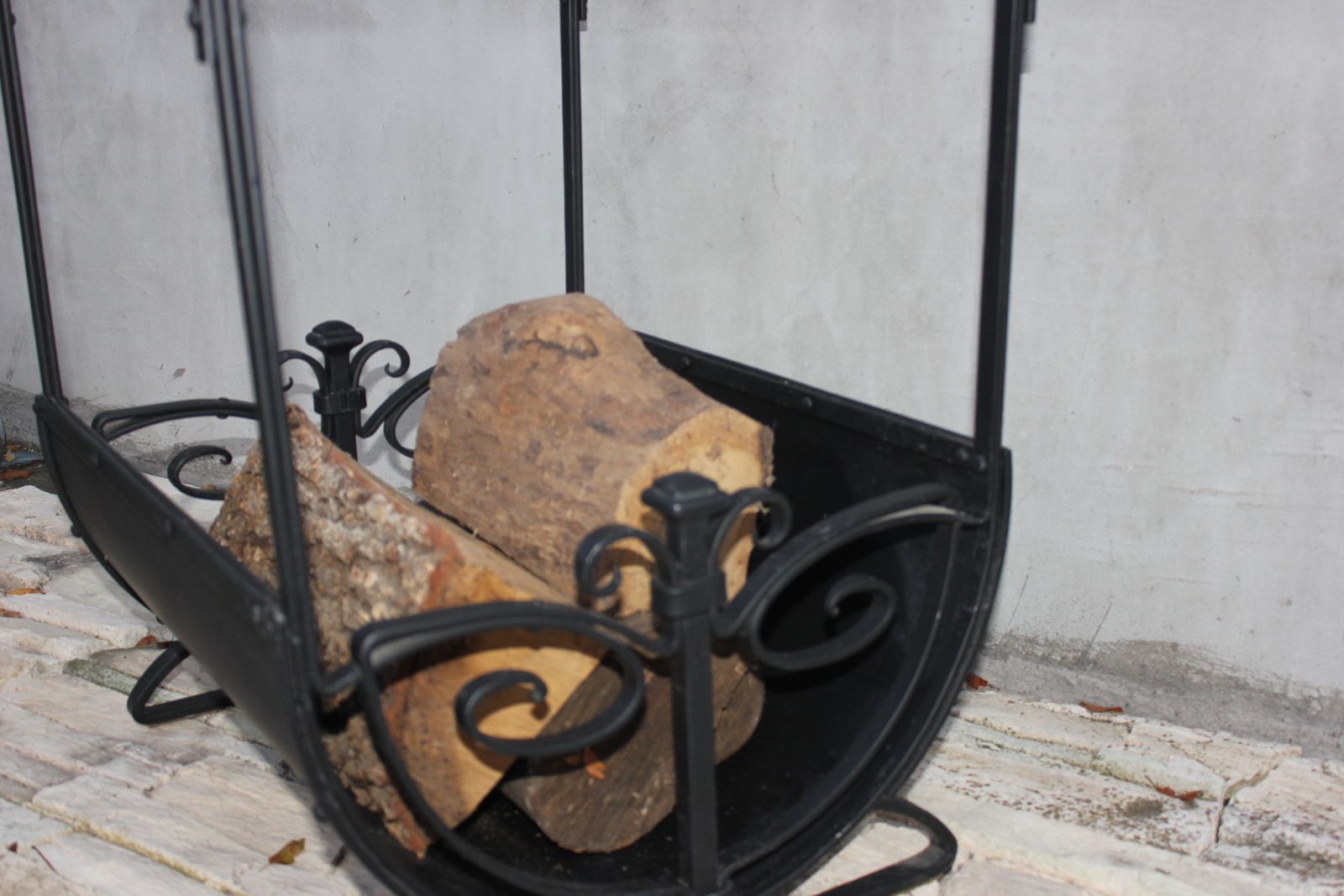 photo buy Fireplace Wood  Rack Indoor Black Wrought Iron Fire Wood Holder Winter Forest House