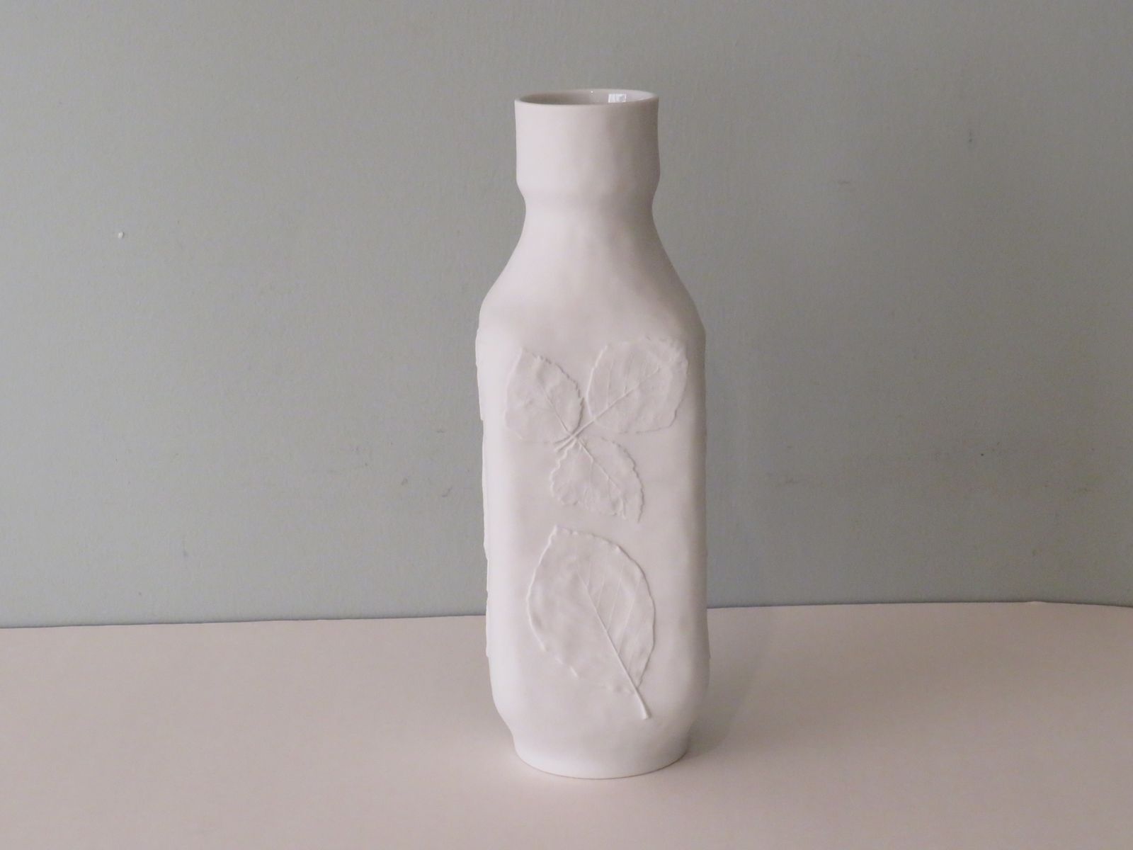 photo for sale White Biscuit Vase With Floral Embossed Motif, Hutschenreuther, Germany 1970s