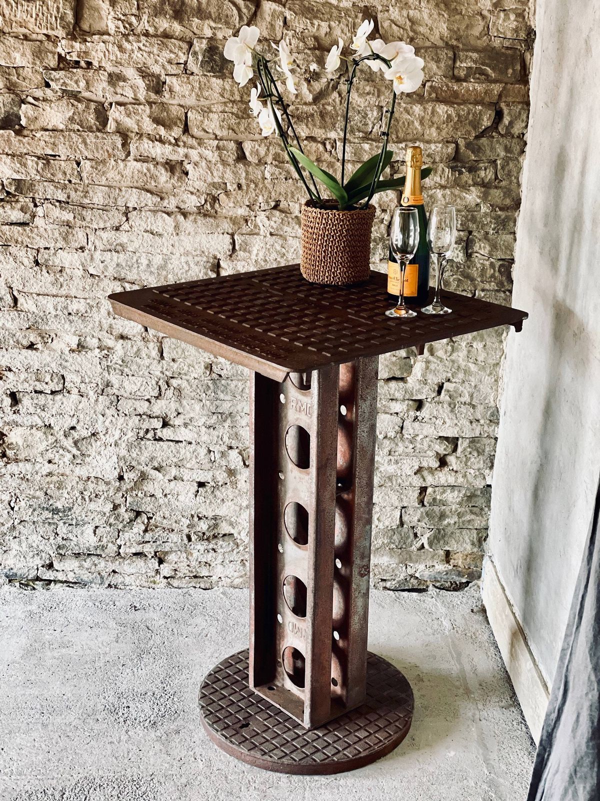 Dino Reclaimed Manhole Bar Table With A Heavy Steel Pedestal Base photo Furniture