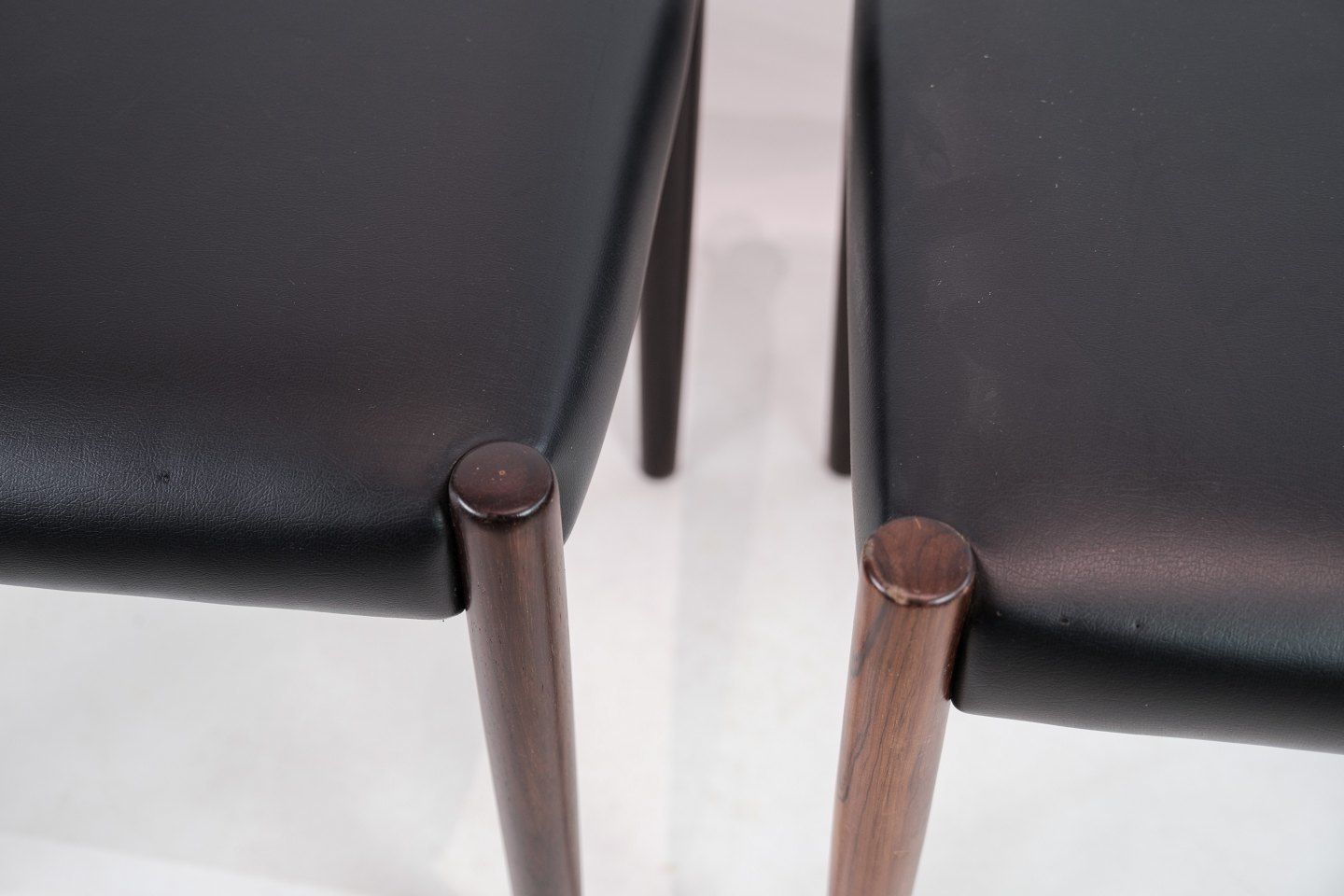 A Set Of Two Stools In Rosewood With Black Leather Of Danish Design From The 1960s. photo for sale