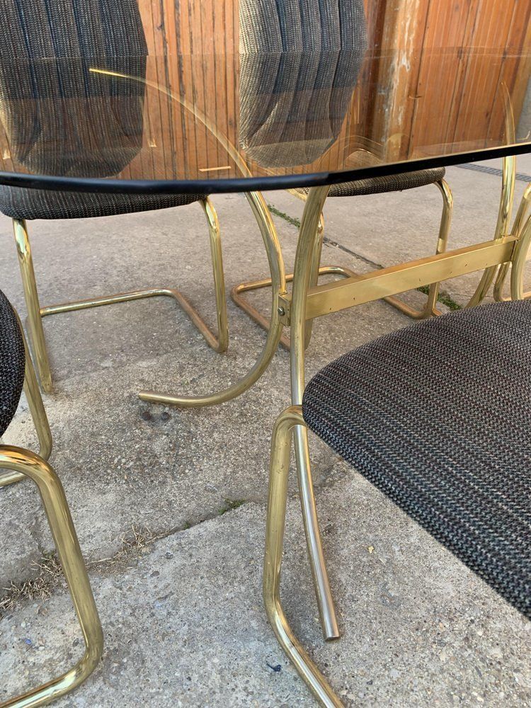 photo furniture Vintage Italian Dining Chairs And Table In Brass, 1970s, Set Of 7
