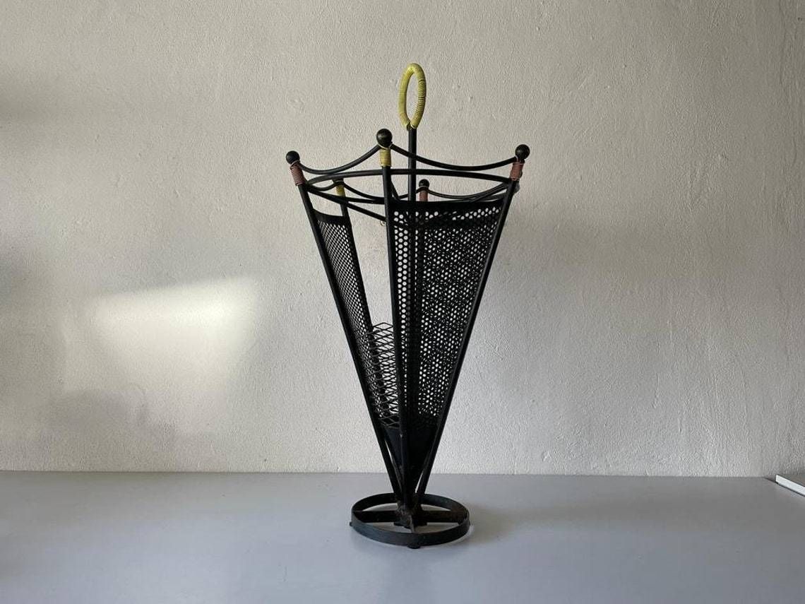 photo furniture Black Metal 6 Slot Umbrella Stand With Yellow Circle Handle, 1950s