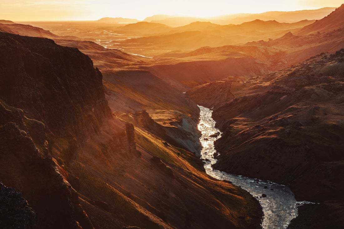 "Iceland Valley With Golden Light And Mountain Silhouettes" By Artur Debat
