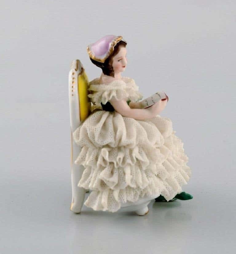 Volkstedt Rudolstadt, Germany, Porcelain Figure, Reading Woman In A Skirt photo furniture