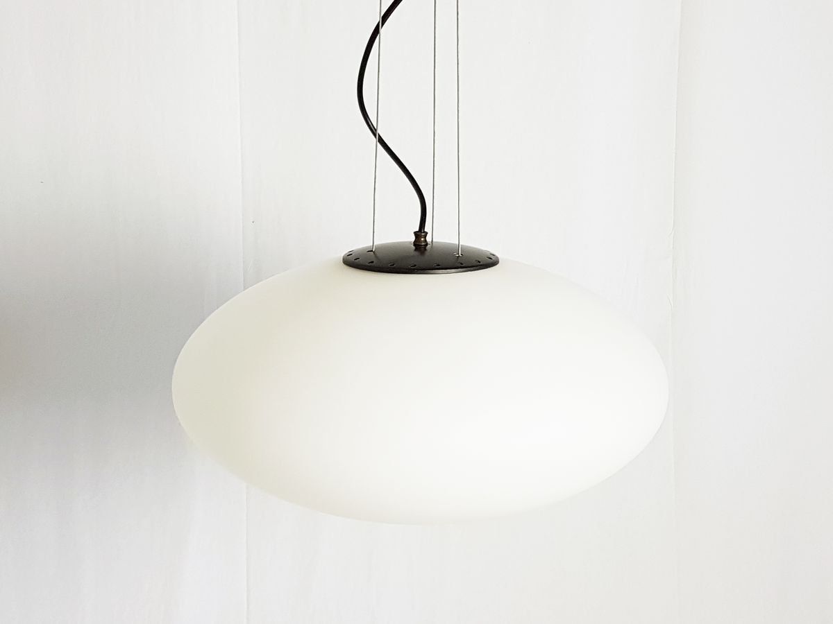 Mid Century Italian Opaline Glass, Brass, And Black Metal Pendant photo for sale