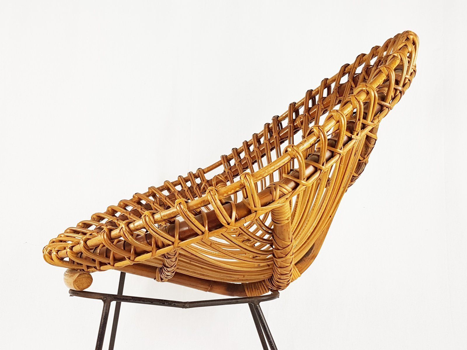 photo furniture Mid Century Italian Rattan And Black Metal Armchair 1950s