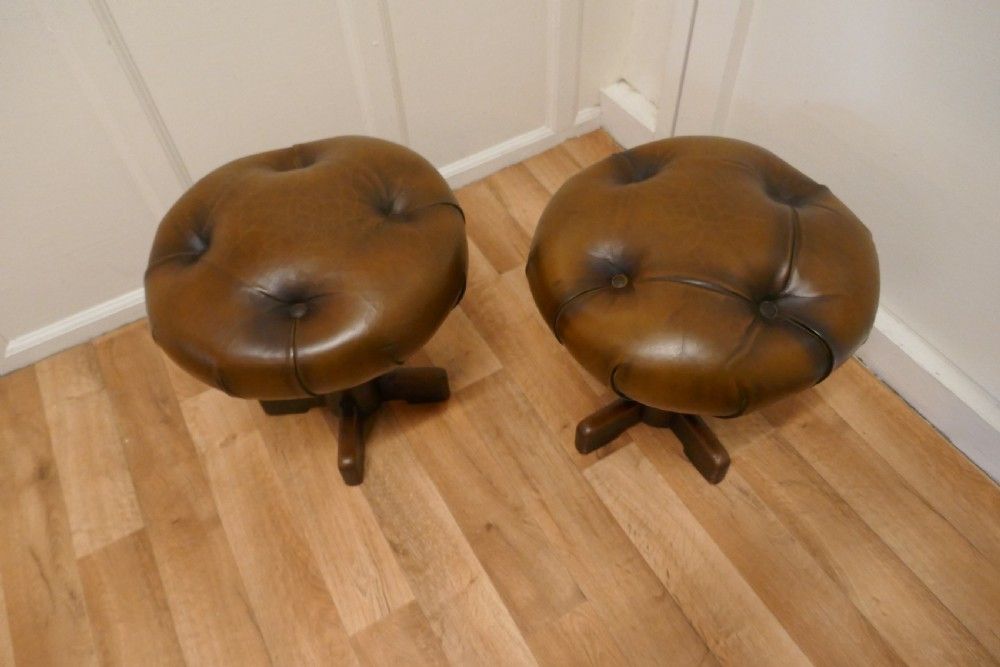 A Pair Of Sturdy French Button Leather Swivel Piano Stools photo vinterior