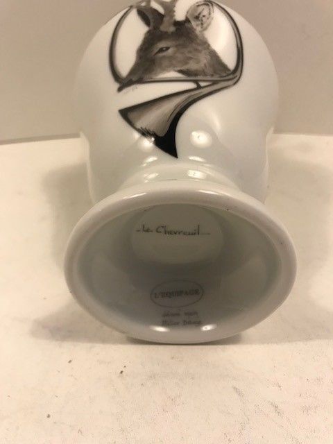 A Modern French Limoges Spirit Lamp With Deer Hunting Motif. photo furniture