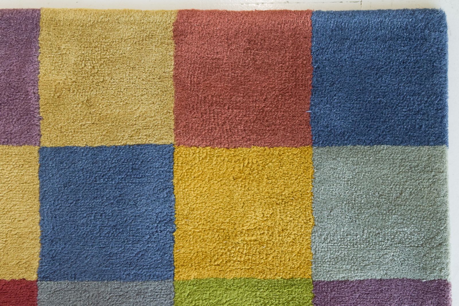 Colourful Chequered Handwoven Rug photo furniture