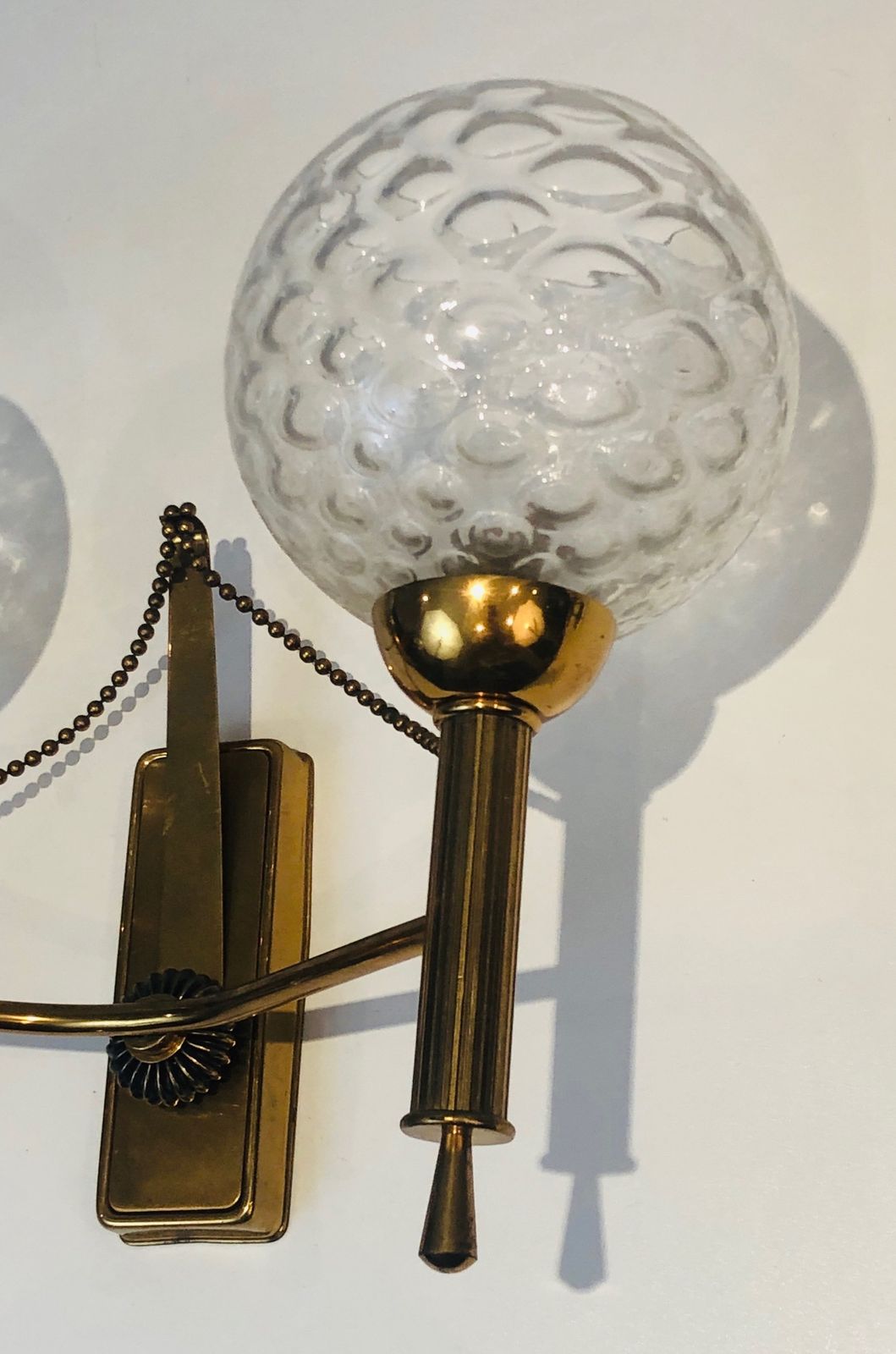 Pair Of Brass And Glass Ball Sconces. Around 1970 photo vintage