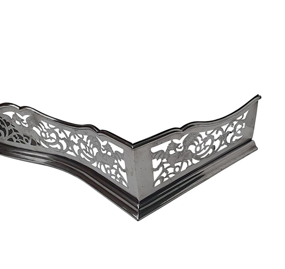 A Rare 19th Century Polished Steel Fender With Flower And Dragon Detail photo for sale