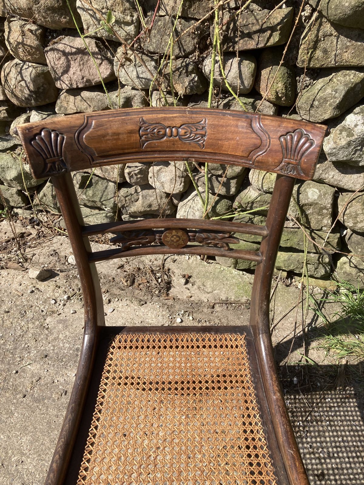 photo for sale Pair Of 1800s Simulated Rosewood, Cane, Saber Leg Dining Chairs
