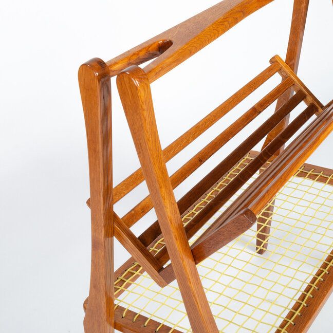 A Wooden Newspaper Stand Made In The 1960s By The Company úluv. photo Home Decor