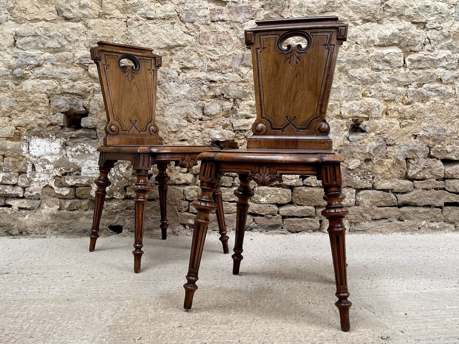 Pair Of Parisian Walnut Hall Chairs.  Maison Guéret Of Paris,