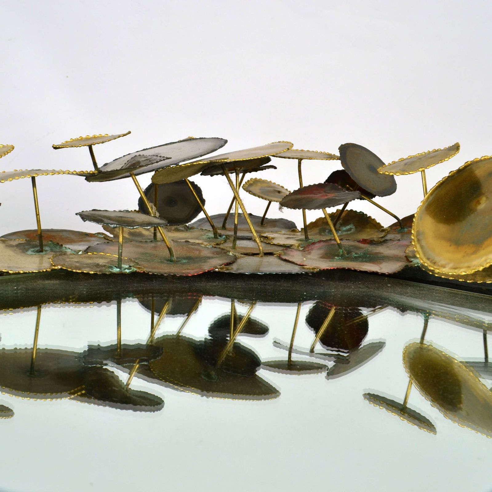 Brutalist Wall Mirror Edged With Metal Circles In The Style Of Curtis photo 1500.0