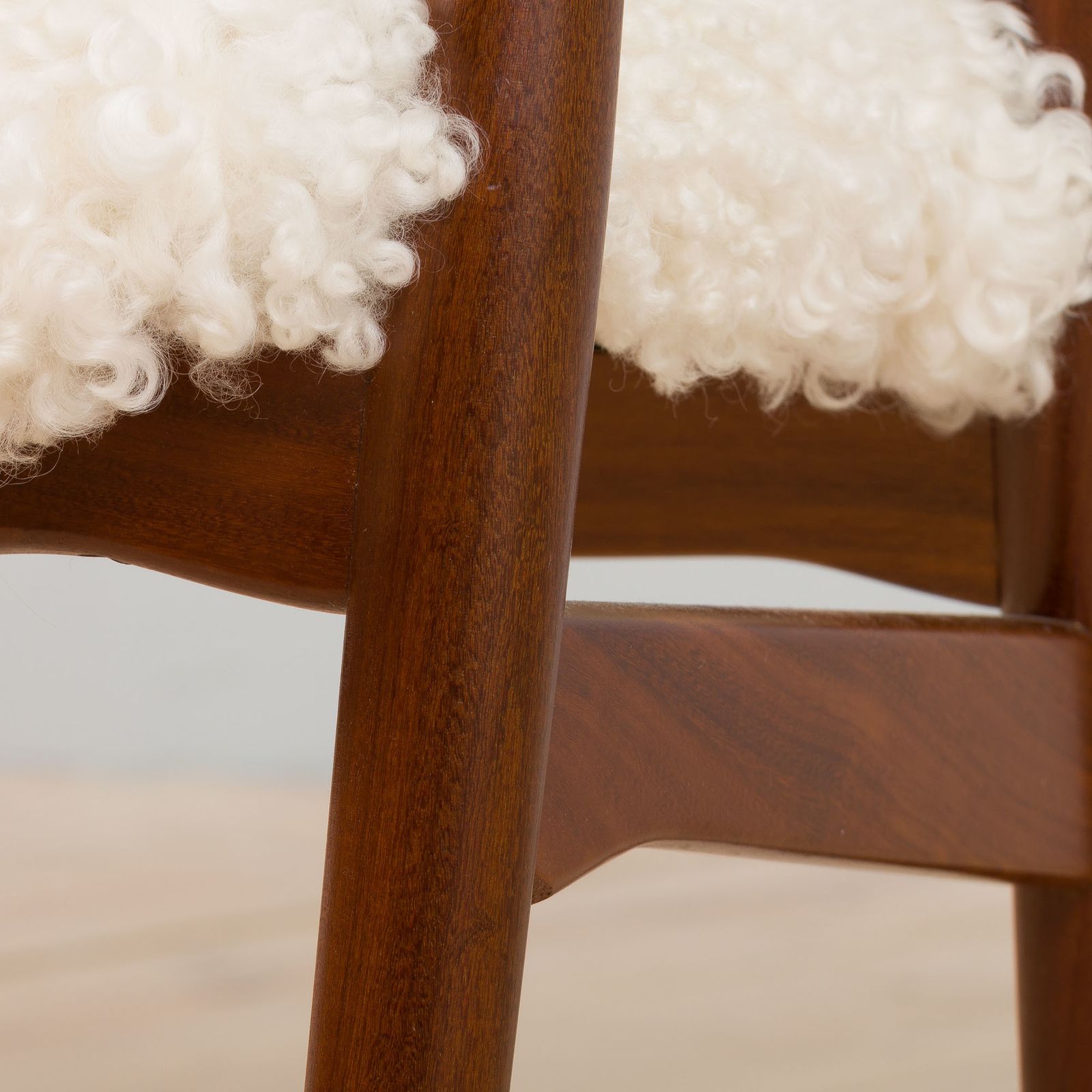 photo furniture Th. Herlev, Farstrup Solid Teak Chair In Natural Sheepskin Upholstery, Denmark 1960s.