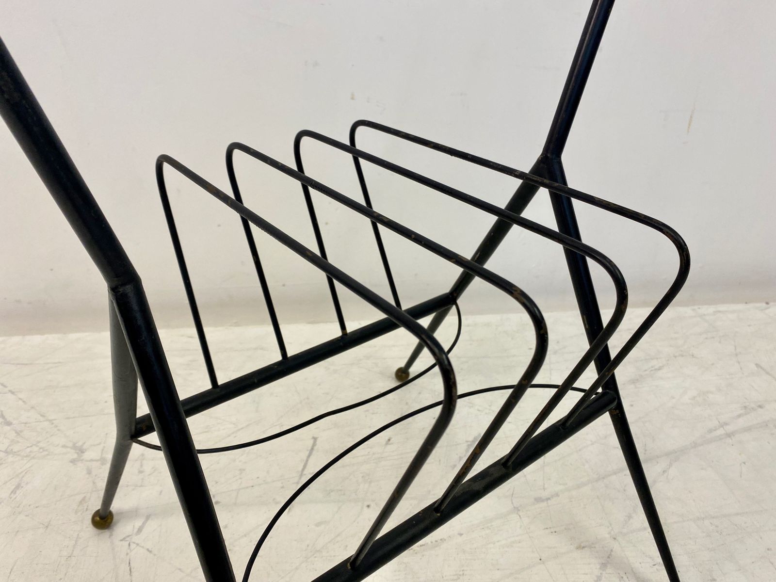 photo furniture 1960s Italian Black Metal And Brass Magazine Rack