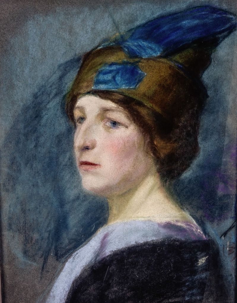 A Large Pastel Portrait On Paper Of A Serene Lady Wearing A Hat