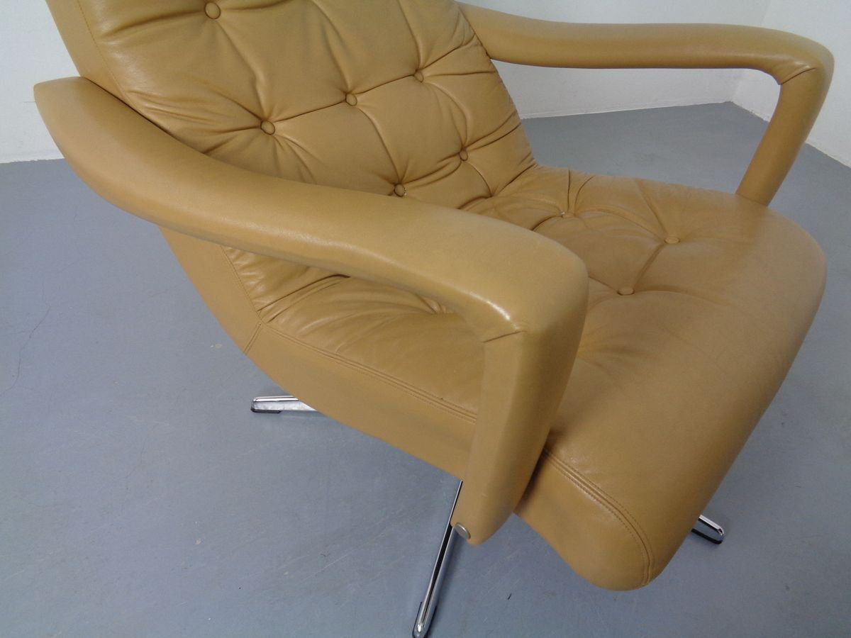 photo vintage Leather Swivel Easy Chair And Ottoman 1970s  Set Of 2
