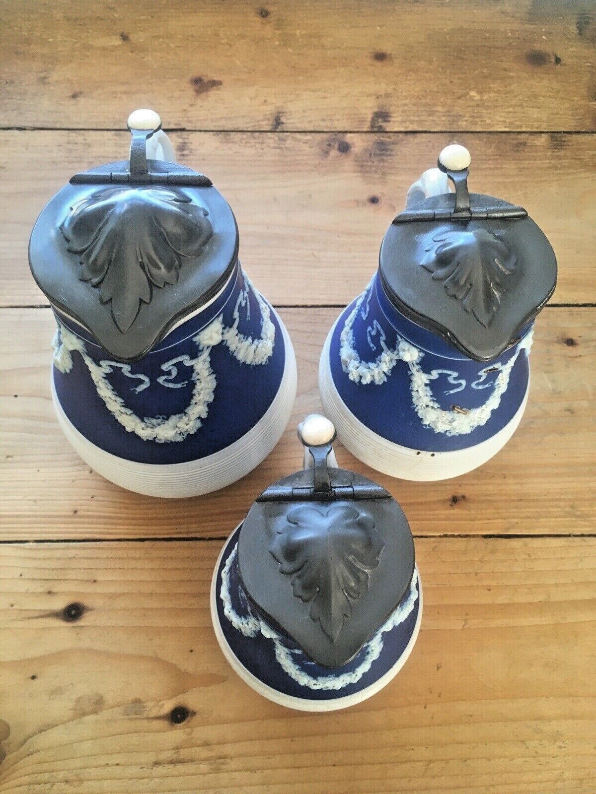 photo furniture Graduated Set Of Cobalt Jasperware Ribbed Lion Pewter Water Jugs Dudson Wedgwood