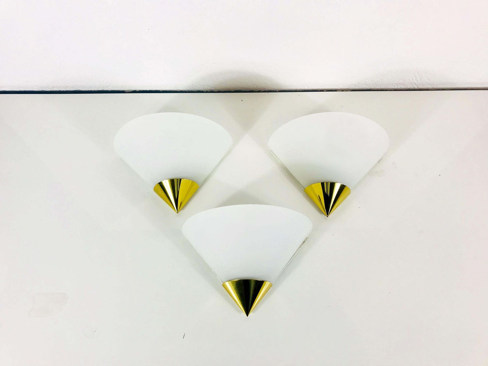 Lighting Set Of 3 Midcentury Brass And Opaline Glass Wall Lamps By Limburg, 1970s photo