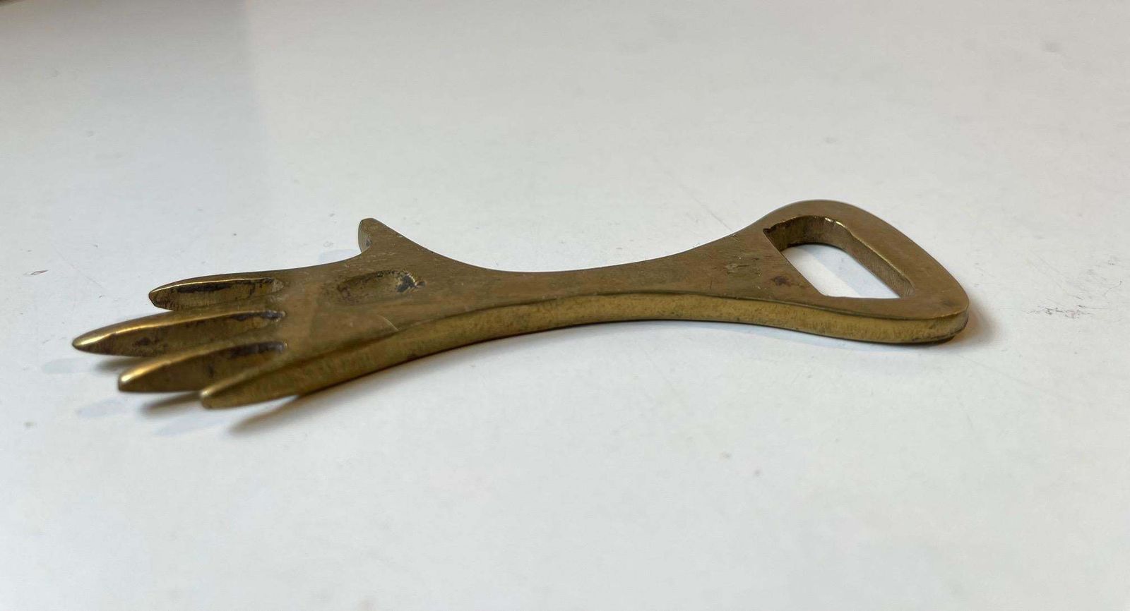 Scandinavian Brass Bottle Cap Opener In The Style Of Carl Auböck, 1950s photo furniture