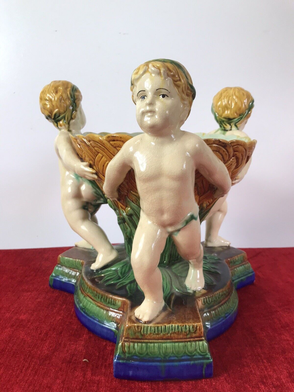 photo furniture Italian Majolica Trio Of Cherubs Centrepiece With Green And Yellow Overglaze