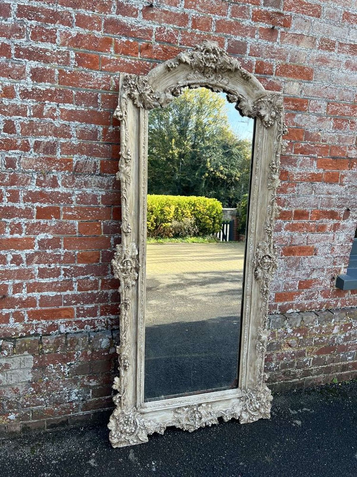 An Impressive Large Antique French 19th C Shaped Top Painted Mirror.