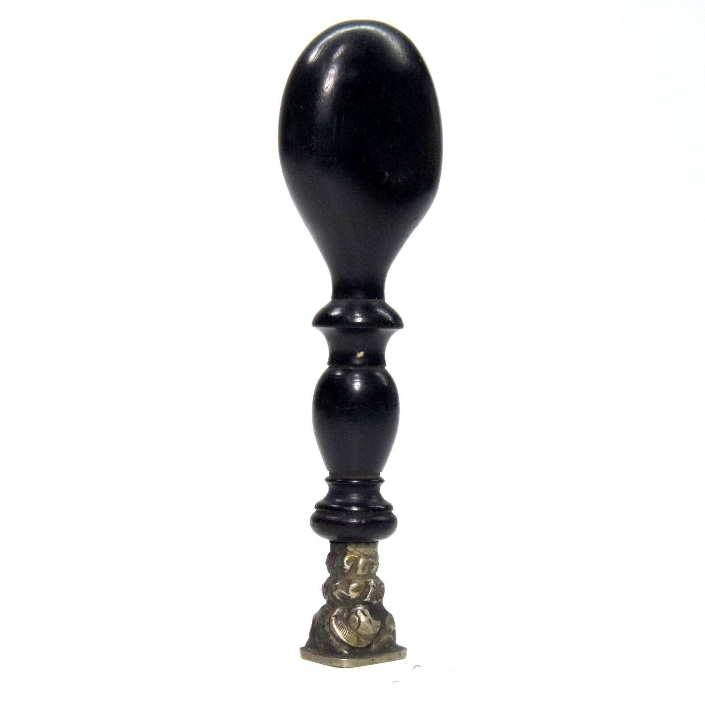 Antique Seal In Ebony And Silver Metal photo furniture