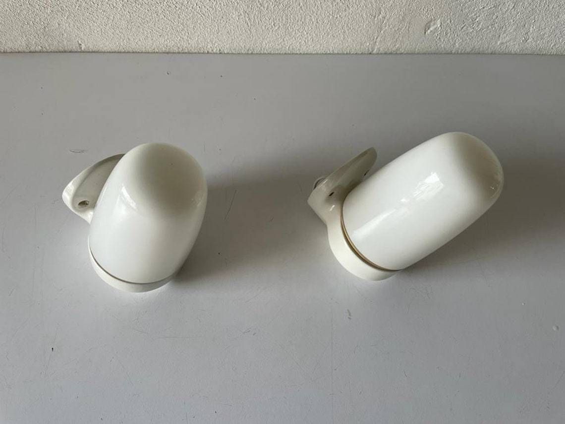 photo for sale Opal Glass And Porcelain Bauhaus Pair Of Mirror Sconces By Wilhelm Wagenfeld For Lindner, 1950s, Germany