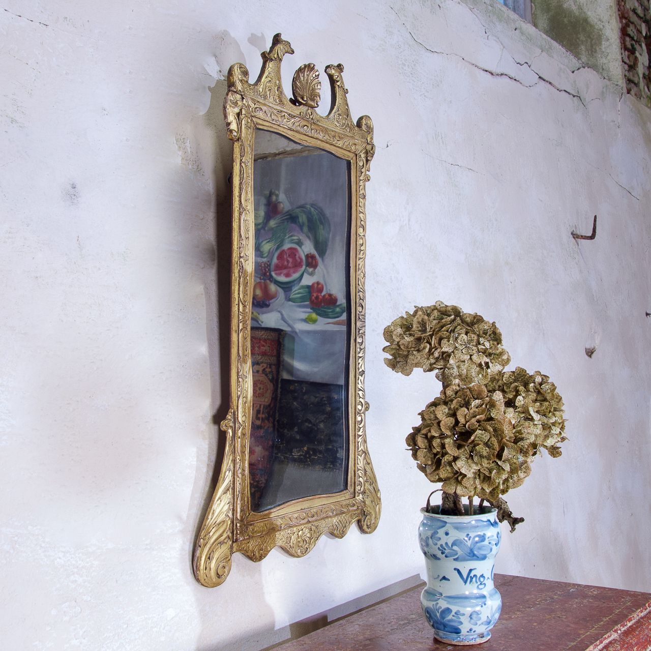 A Late 19th Century George II Style Giltwood Mirror