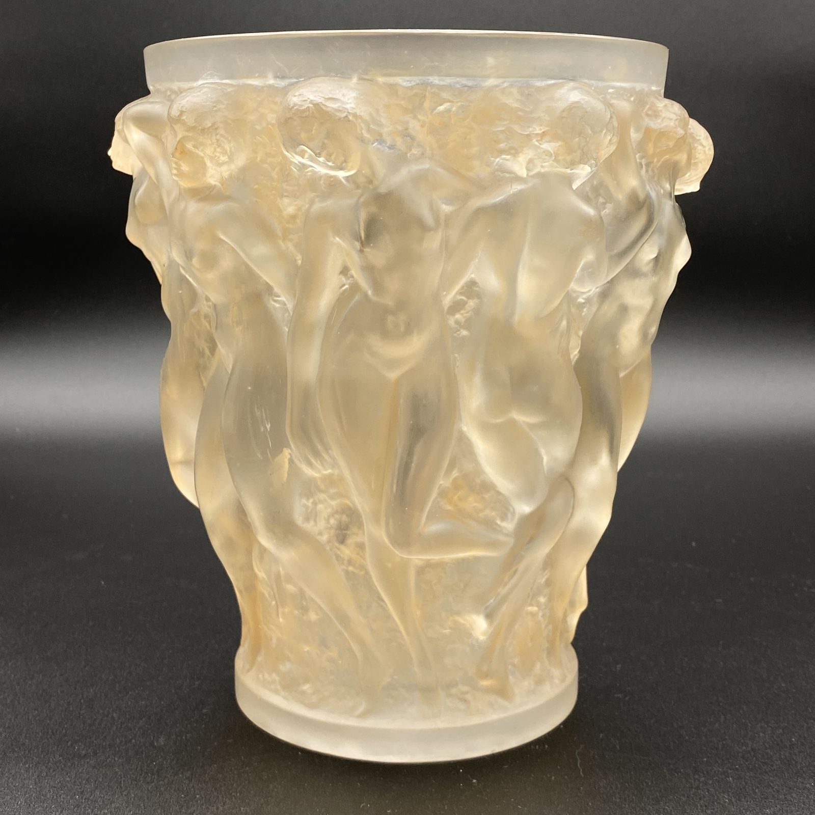 A Rene Lalique Bacchantes Vase In White And Sienna Patinated Glass.