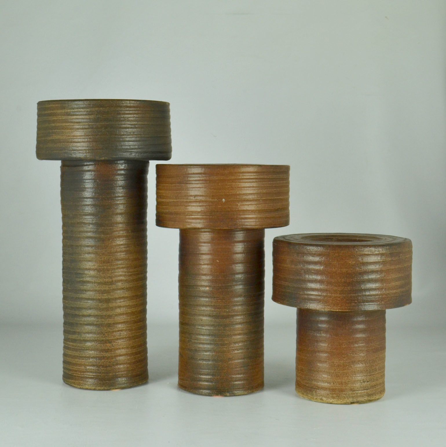 photo for sale Set Of Treetall Cylinder Vases In Earth Tones