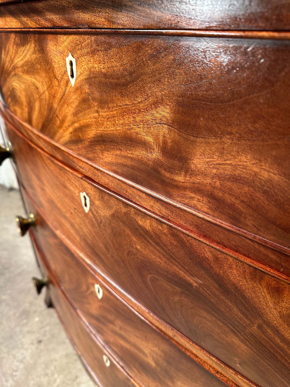Furniture A Beautiful Regency Flame Mahogany Bow Front Chest Of Drawers Circa 1830 photo