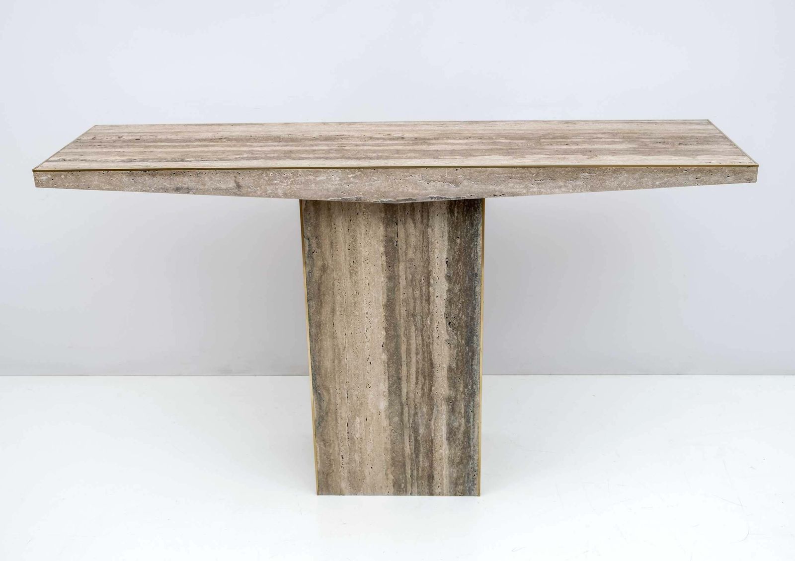photo furniture Pair Of Mid Century Italian Unfilled Travertine And Brass Inlay Console Tables