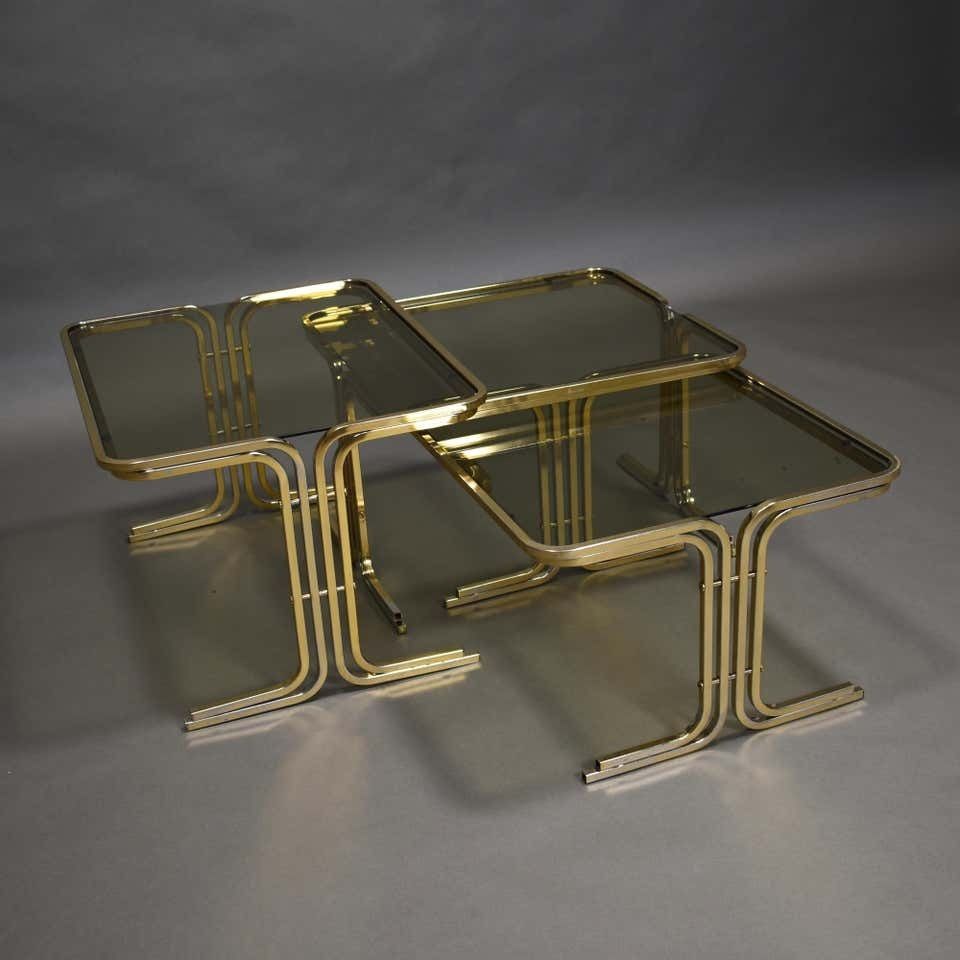 photo furniture Italian 1970s Nesting Tables Gold / Smoked Glass, Italy, Circa 1970
