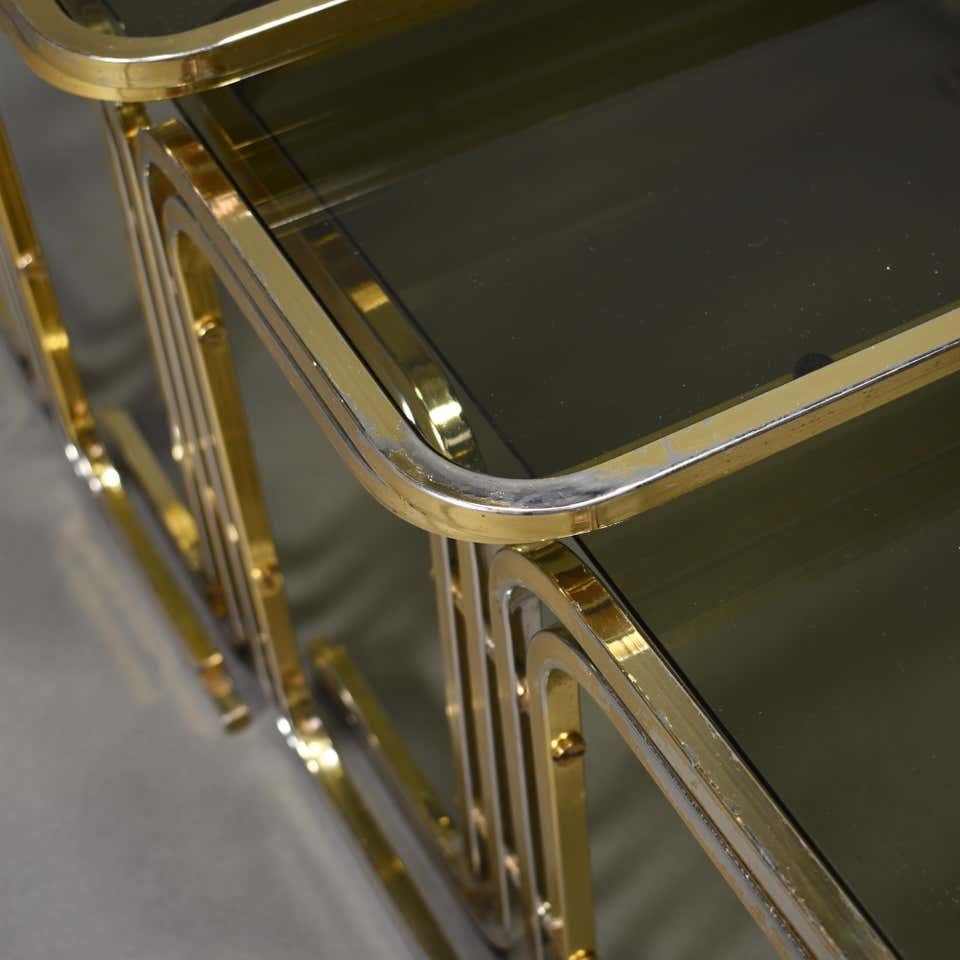 photo vinterior Italian 1970s Nesting Tables Gold / Smoked Glass, Italy, Circa 1970