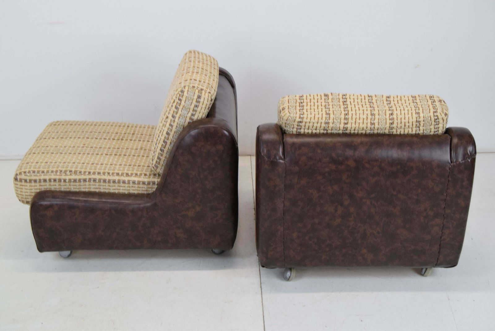 Pair Of Mid Century Leatherette Armchairs On The Wheels,1970's. photo vintage