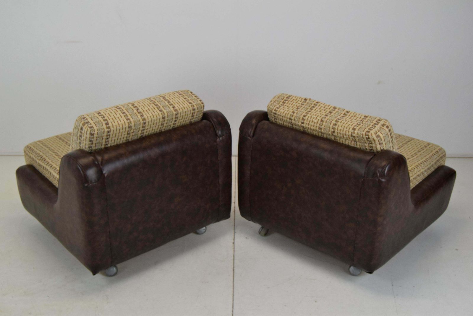 Furniture Pair Of Mid Century Leatherette Armchairs On The Wheels,1970's. photo