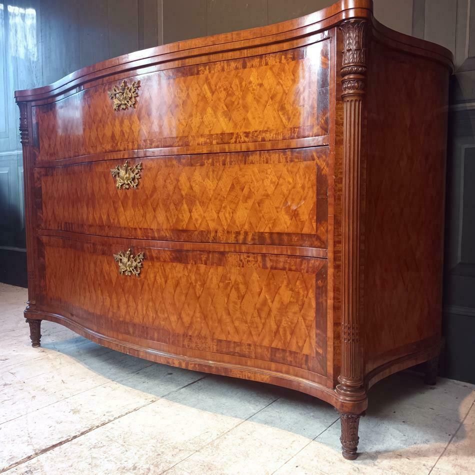 A Late 19th Century Serpentine Satinwood Commode photo for sale