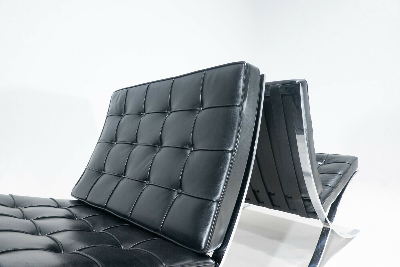 Pair Of Black Leather "Barcelona" Chairs By Mies Van Der Rohe For Knoll photo for sale