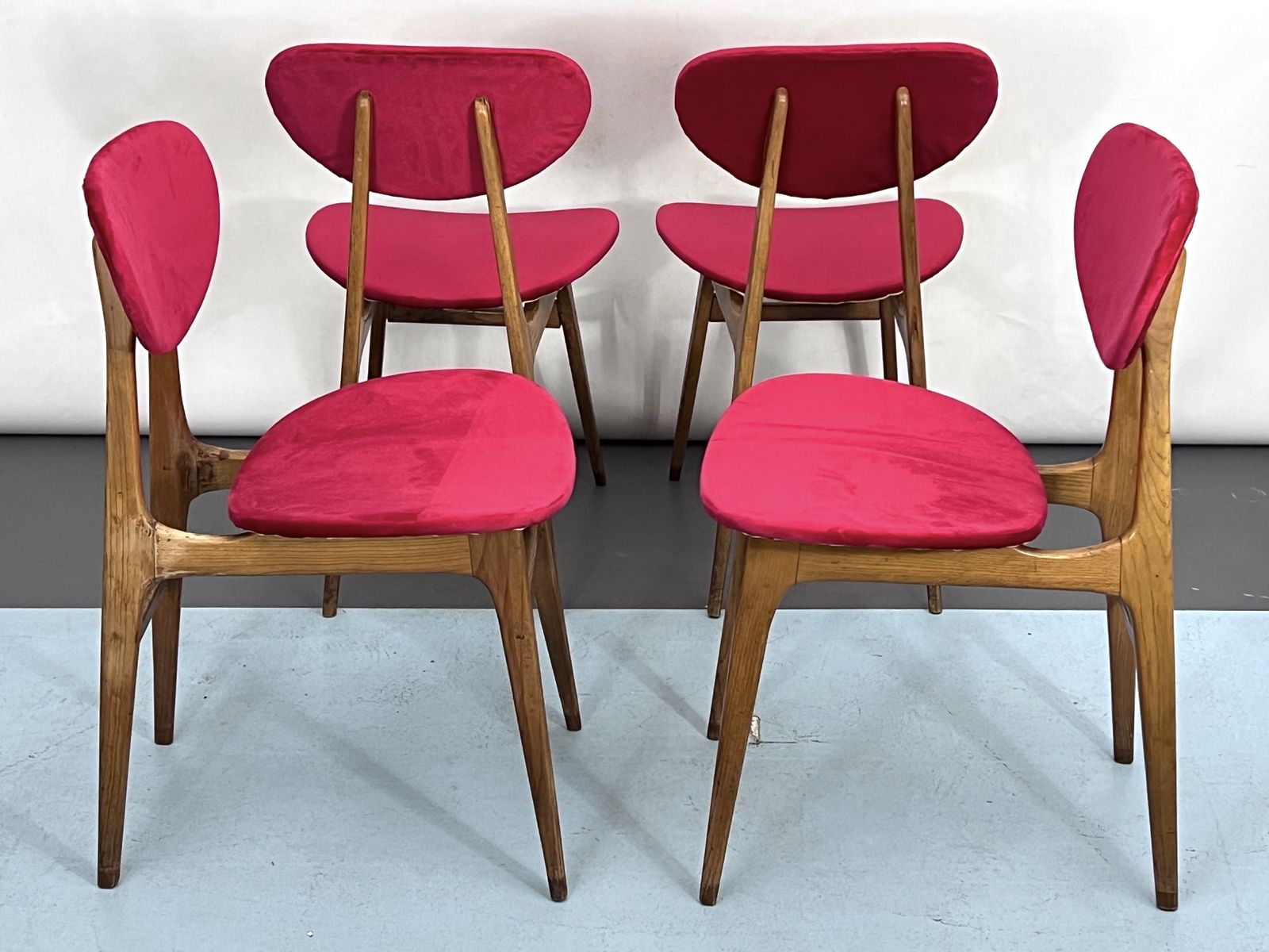 photo for sale Mid Century Set Of Four Red Velvet And Wood Dining Chairs. Italy 1950s