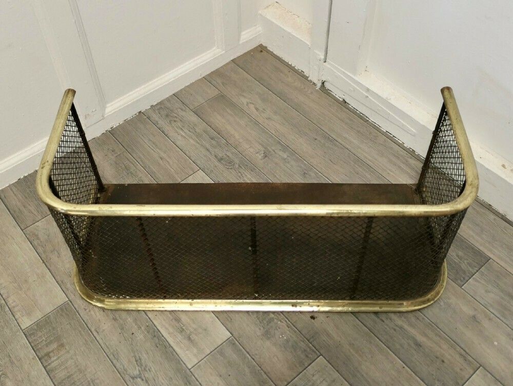 A Victorian Brass And Iron Fender Or Fireguard photo furniture