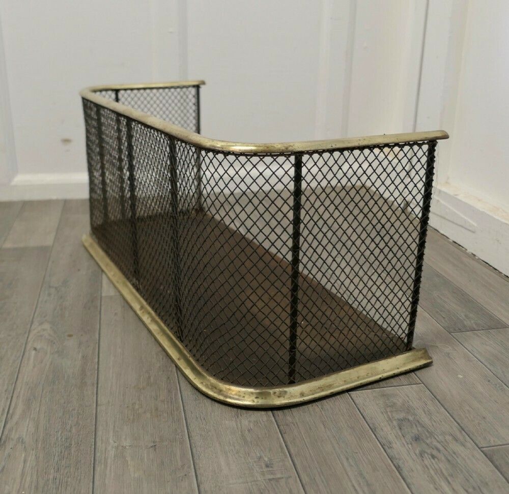 A Victorian Brass And Iron Fender Or Fireguard photo for sale