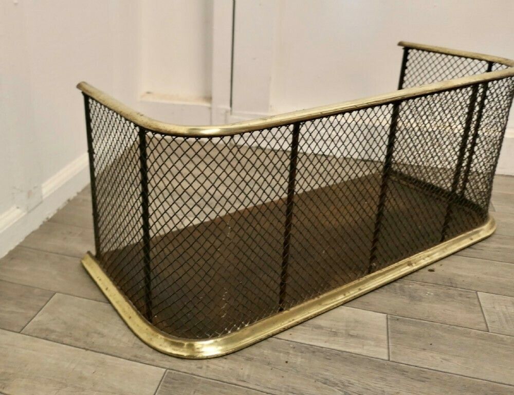 A Victorian Brass And Iron Fender Or Fireguard photo Home Fixtures