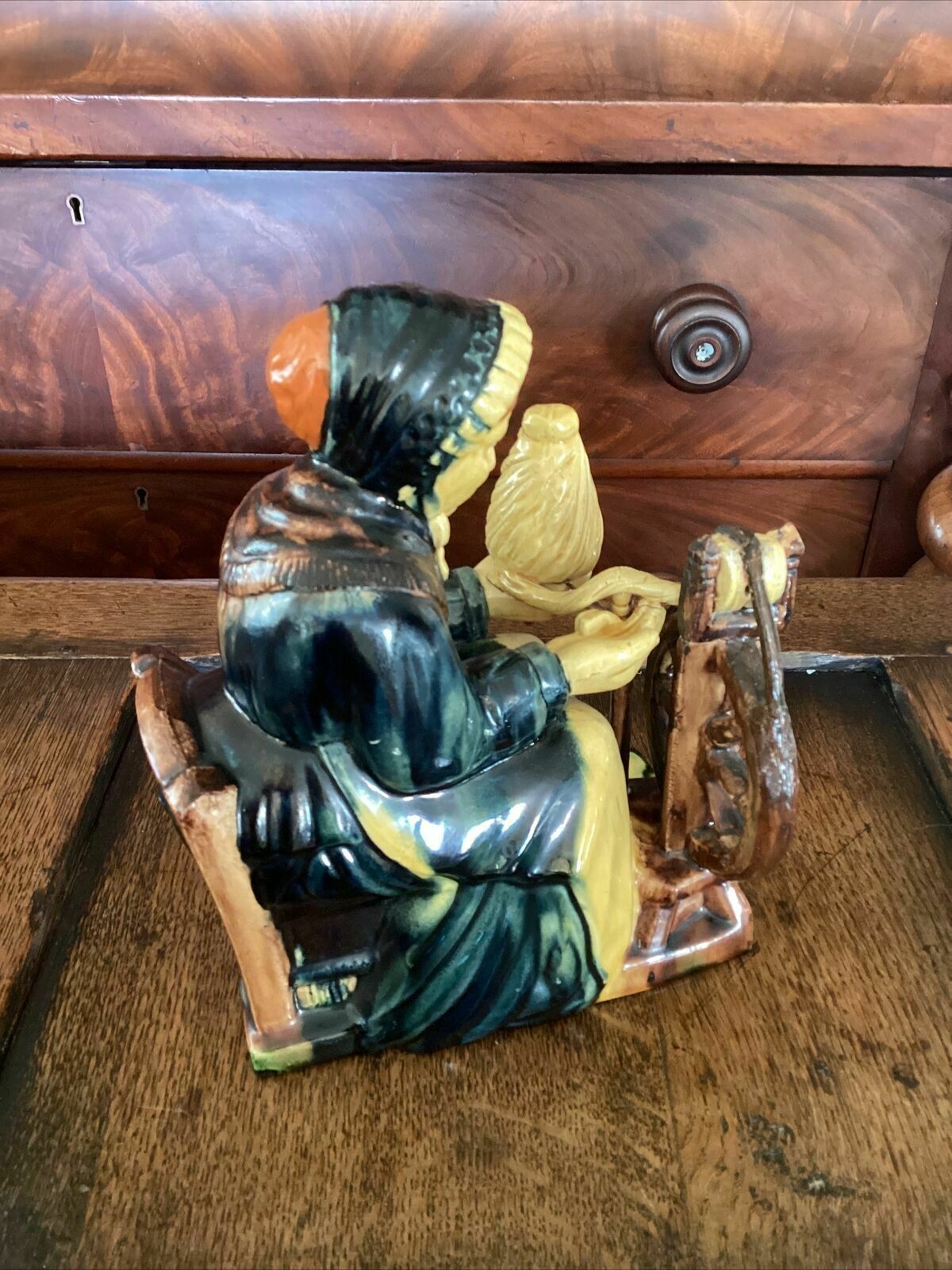photo for sale Early 20th C Continental Bisque Pottery Figurine. Dutch Woman Spinning Yarn