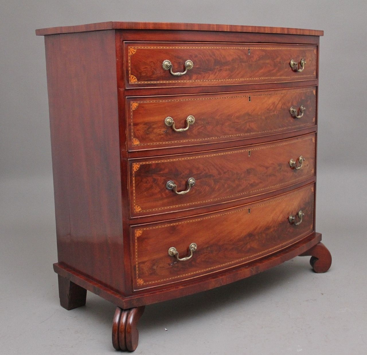 A Highly Decorative Early 19th Century Flame Mahogany And Inlaid Bowfront Chest Of Drawers photo furniture