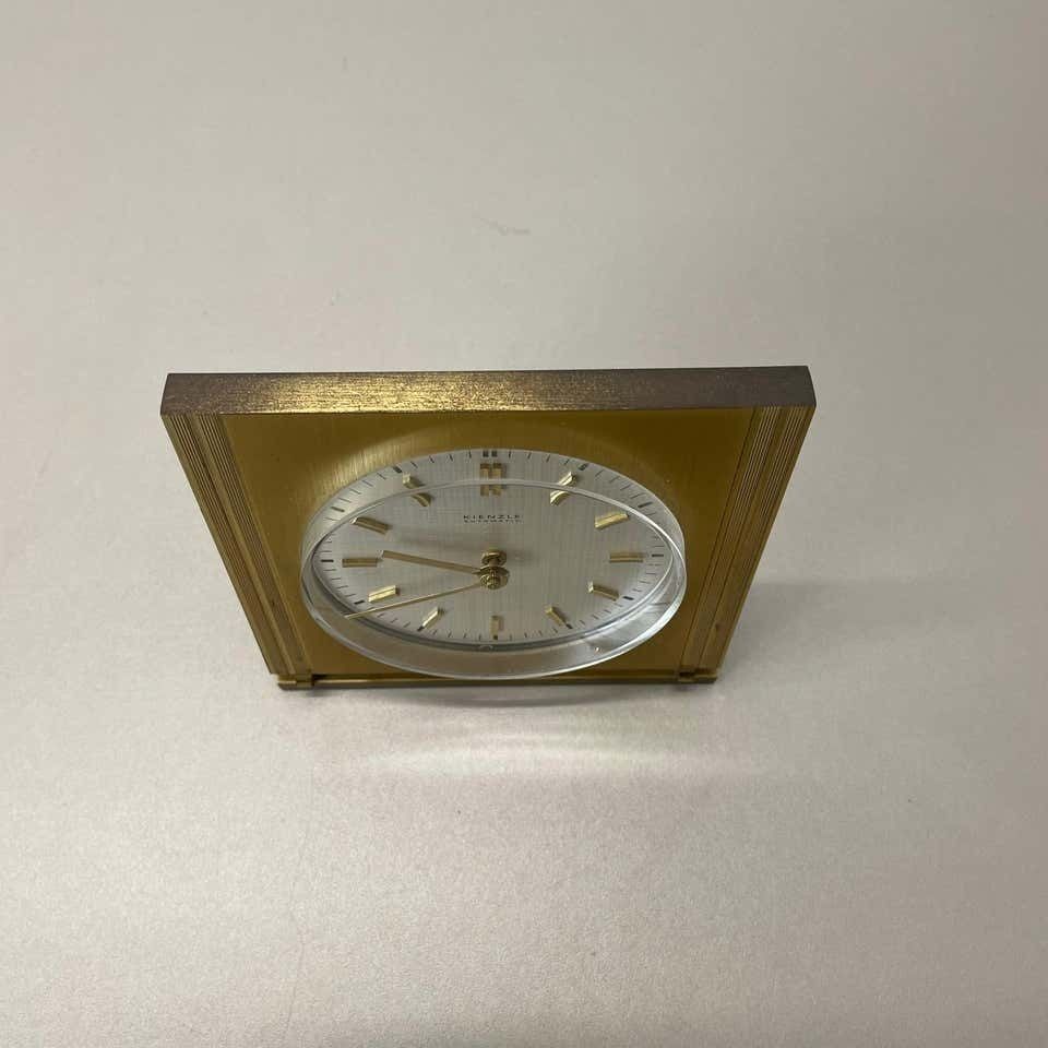 photo for sale Vintage Hollywood Regency Brass Glass Table Clock By Kienzle, Germany 1960s