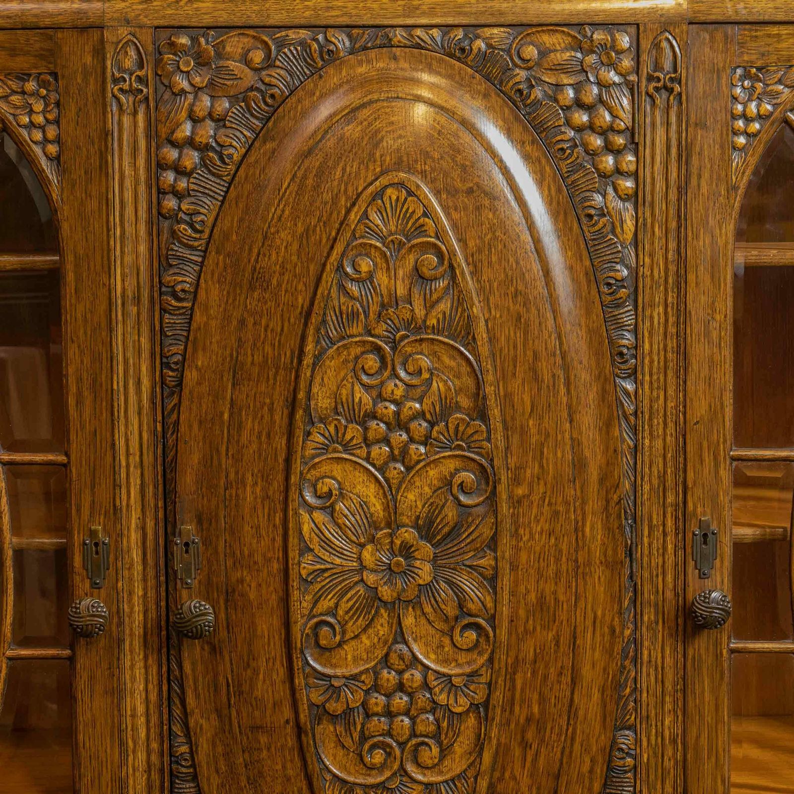 photo for sale Early 20th Century Carved Oak Bookcase