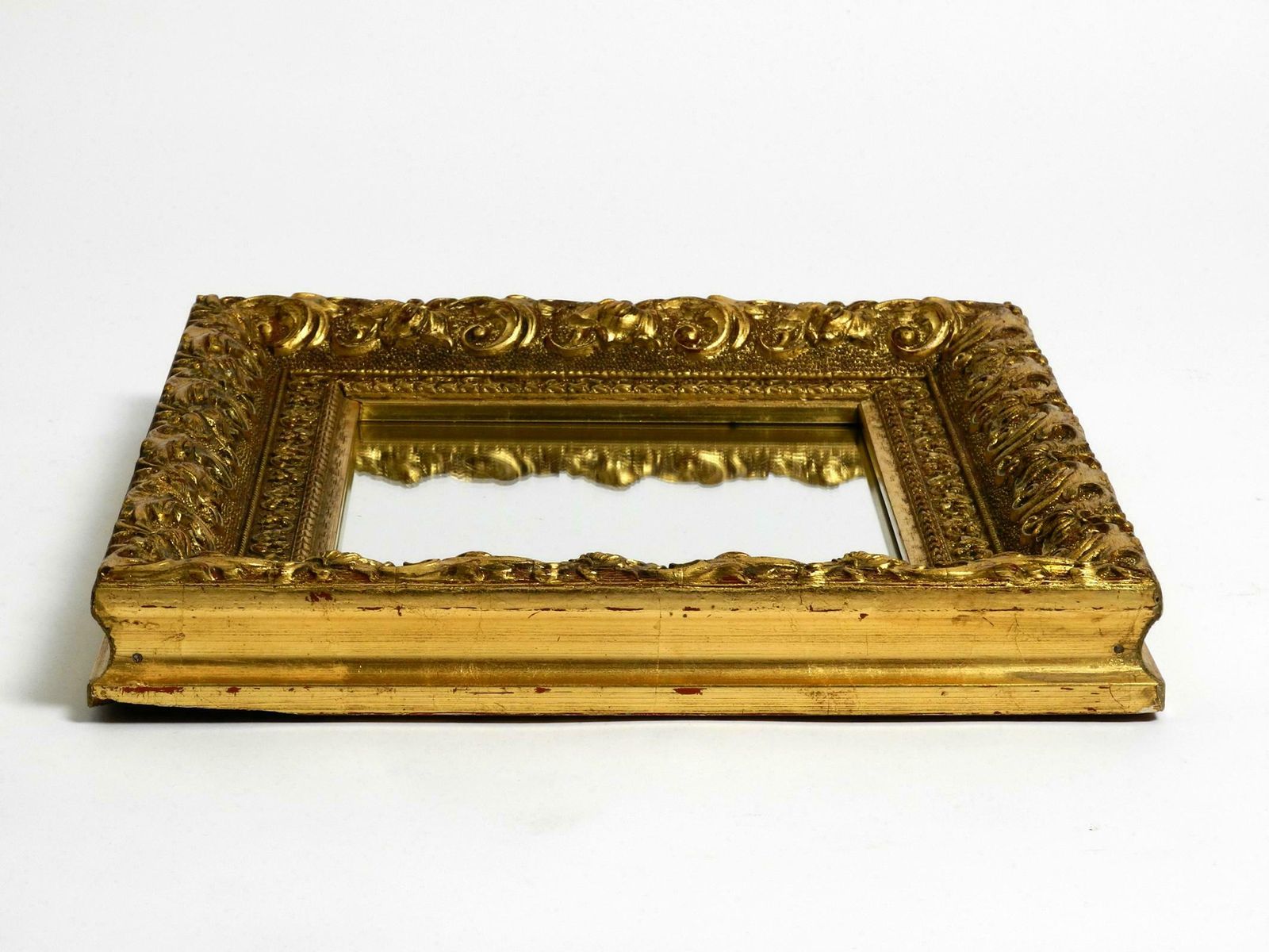 Beautiful Wall Mirror From Italy With An Ornate, Gold Plated Frame photo for sale